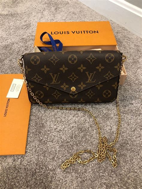 louis vuitton black purse with gold chain|louis vuitton black bag price.